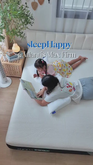 The Atlantis Max Firm mattress, made with natural latex and memory foam, offers a firm feel, relieves back pain, and features a cooling fabric for a comfortable night's sleep.